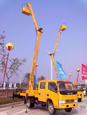 硬核出征！百台臂车助力建造大美新疆