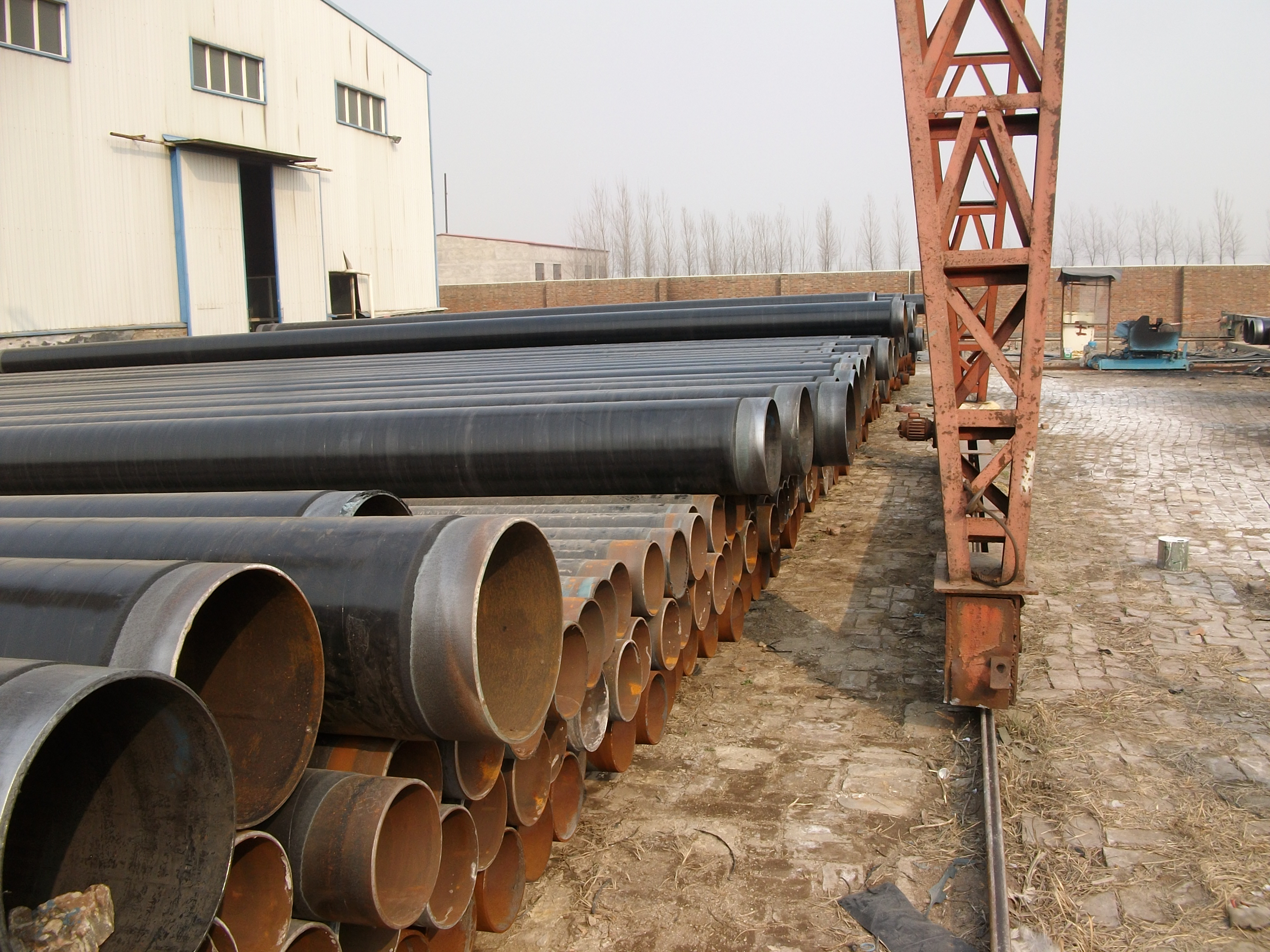 q235螺旋钢管外壁做加强级3pe防腐多少钱一米