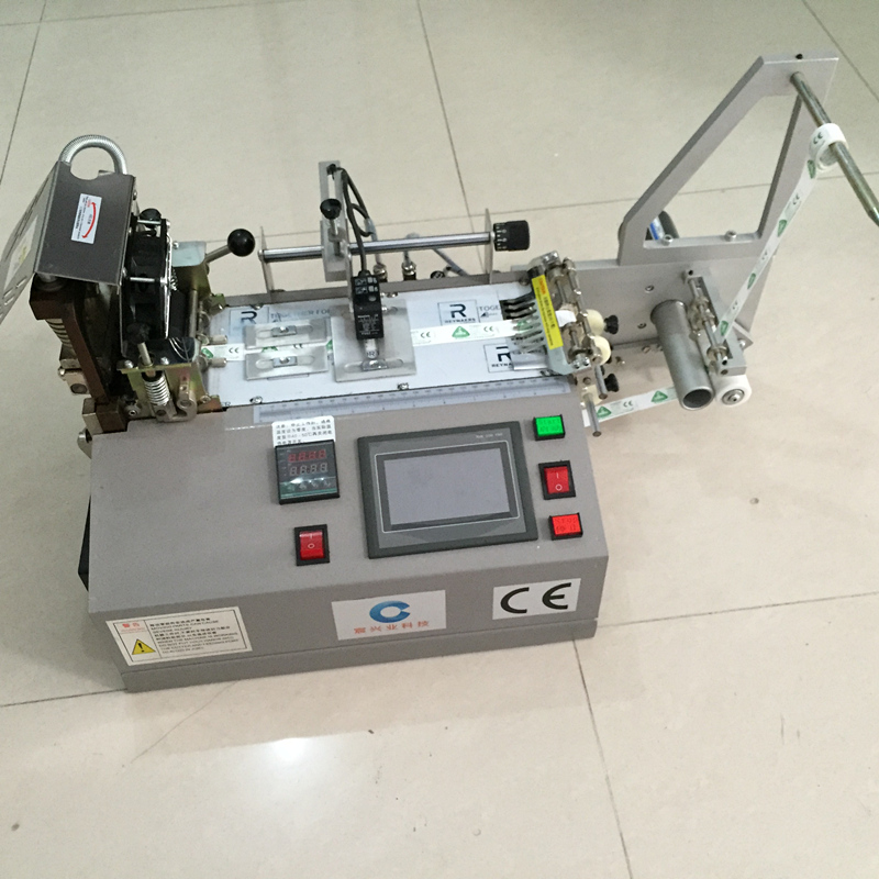 南昌服饰水洗标切标机 纯棉织唛裁唛机 肩章胸标剪切机 正品直销