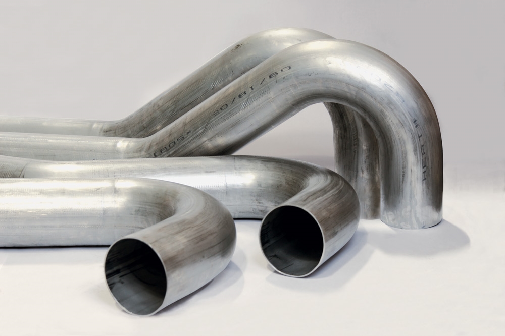 公司承接各种金属型材弯圆加工,如304不锈钢弯管,椭圆管弯圆,焊管弯曲